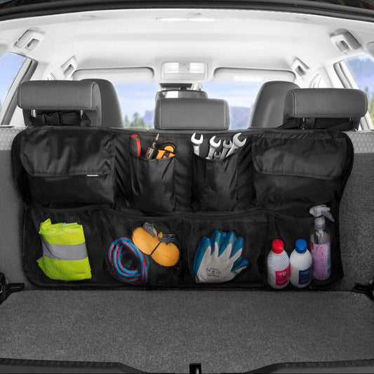 Car trunk organizer with various tools and items inside