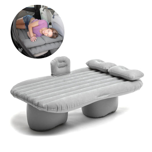 Inflatable bed with pillows