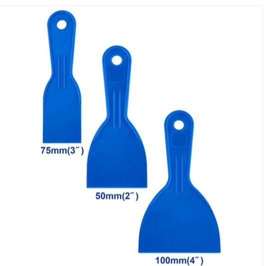 Three blue putty knives of different sizes 